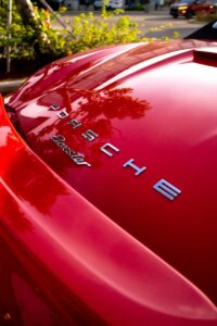 a red car parked on the side of the road